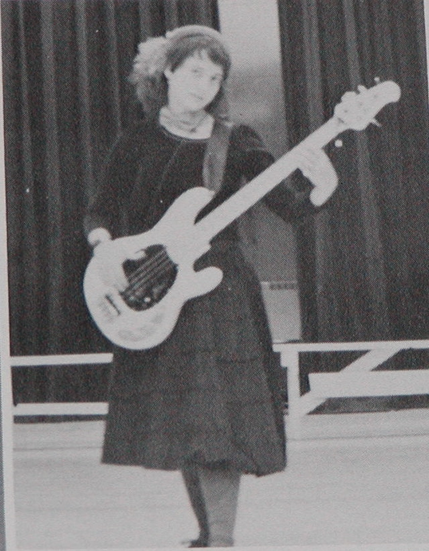 young mandy playing bass